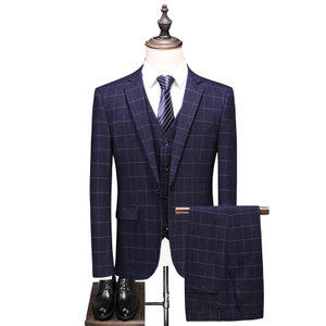 The latest fashion navy blue men's chequered suit gentleman slim version of the business occasion